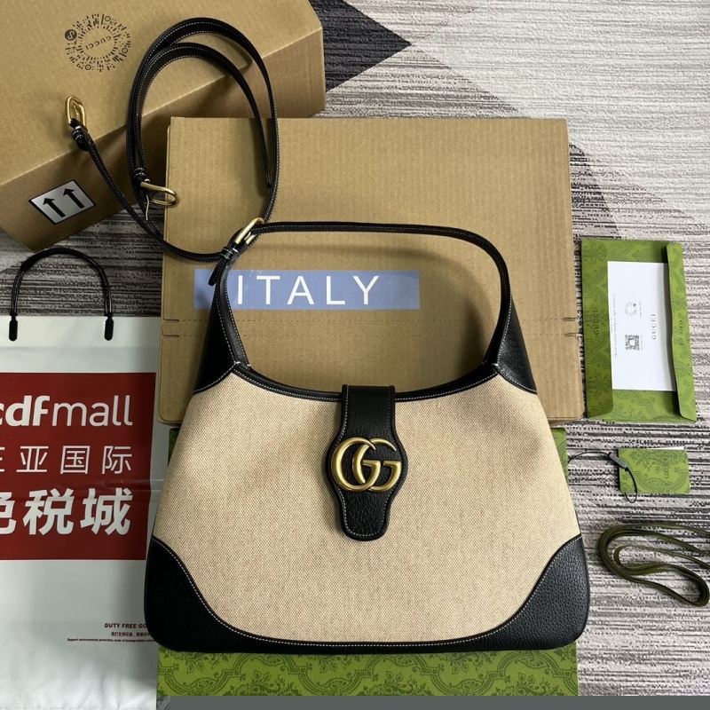 G*u*i top handle bags
